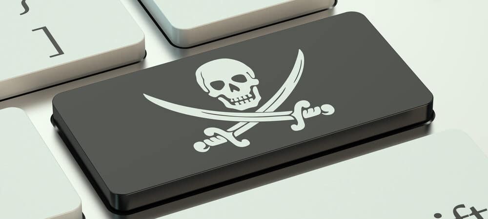 imagem de um botão de teclado com o desenho de uma caveira, remetendo a pirata, dessa forma fazendo uma analogia à pirataria