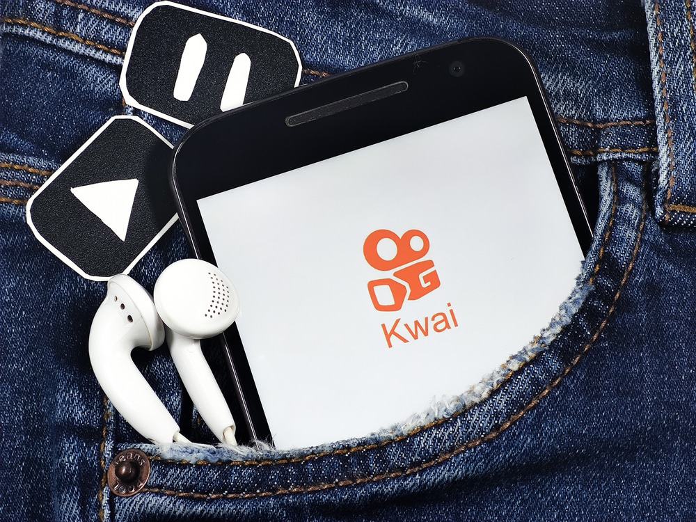 Cell phone with the Kwai app logo