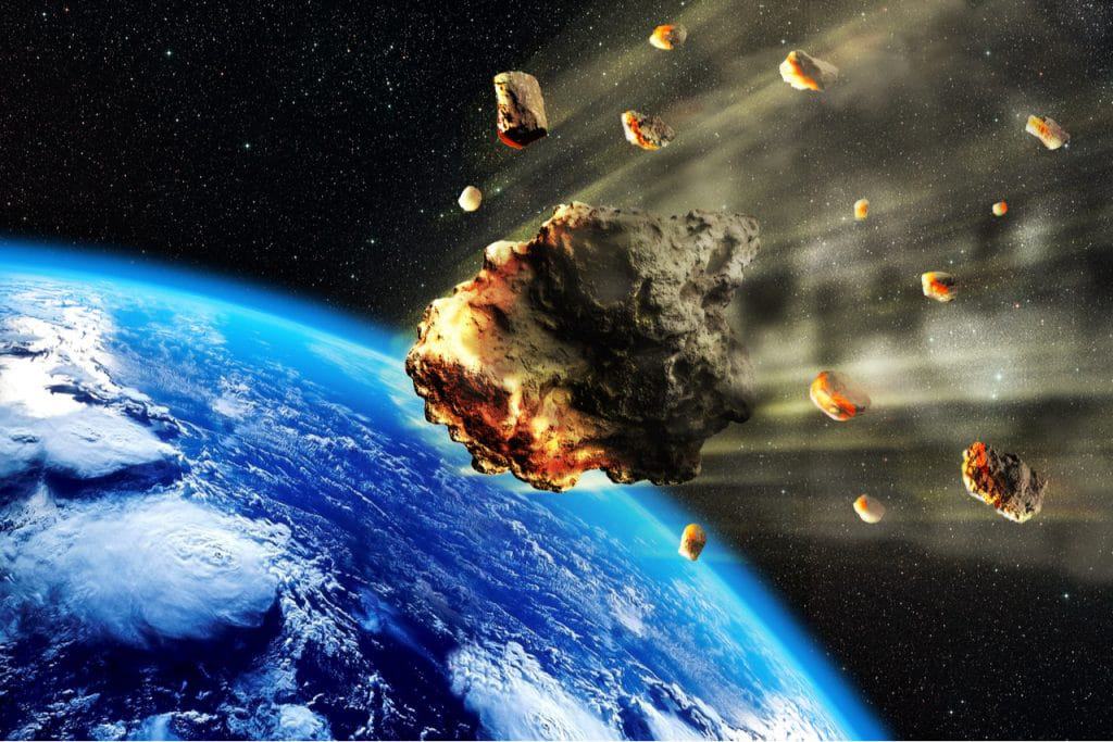 Imagem mostra renderização artística de um meteorito em rota de colisão com a Terra
