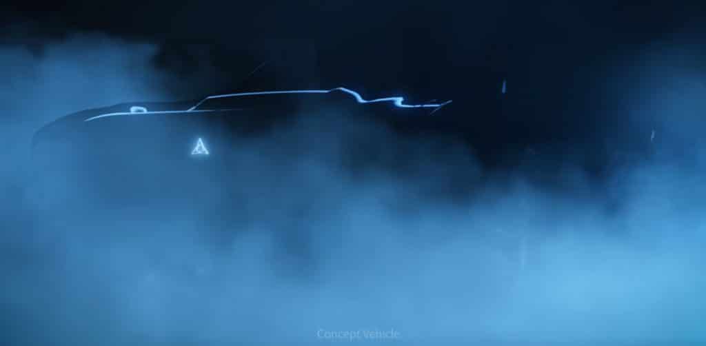 Imagem conceitual do Dodge elétrico exibe carro na penumbra revelando faixa luminosa na lateral do veículo.