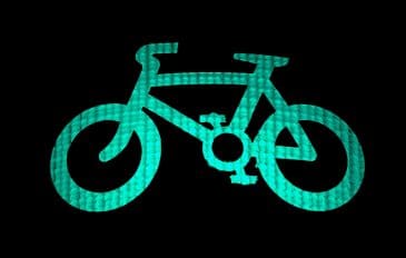 Ilustração de uma bicicleta verde para remeter à lei de transporte de bens serviços por bicicletas e triciclos