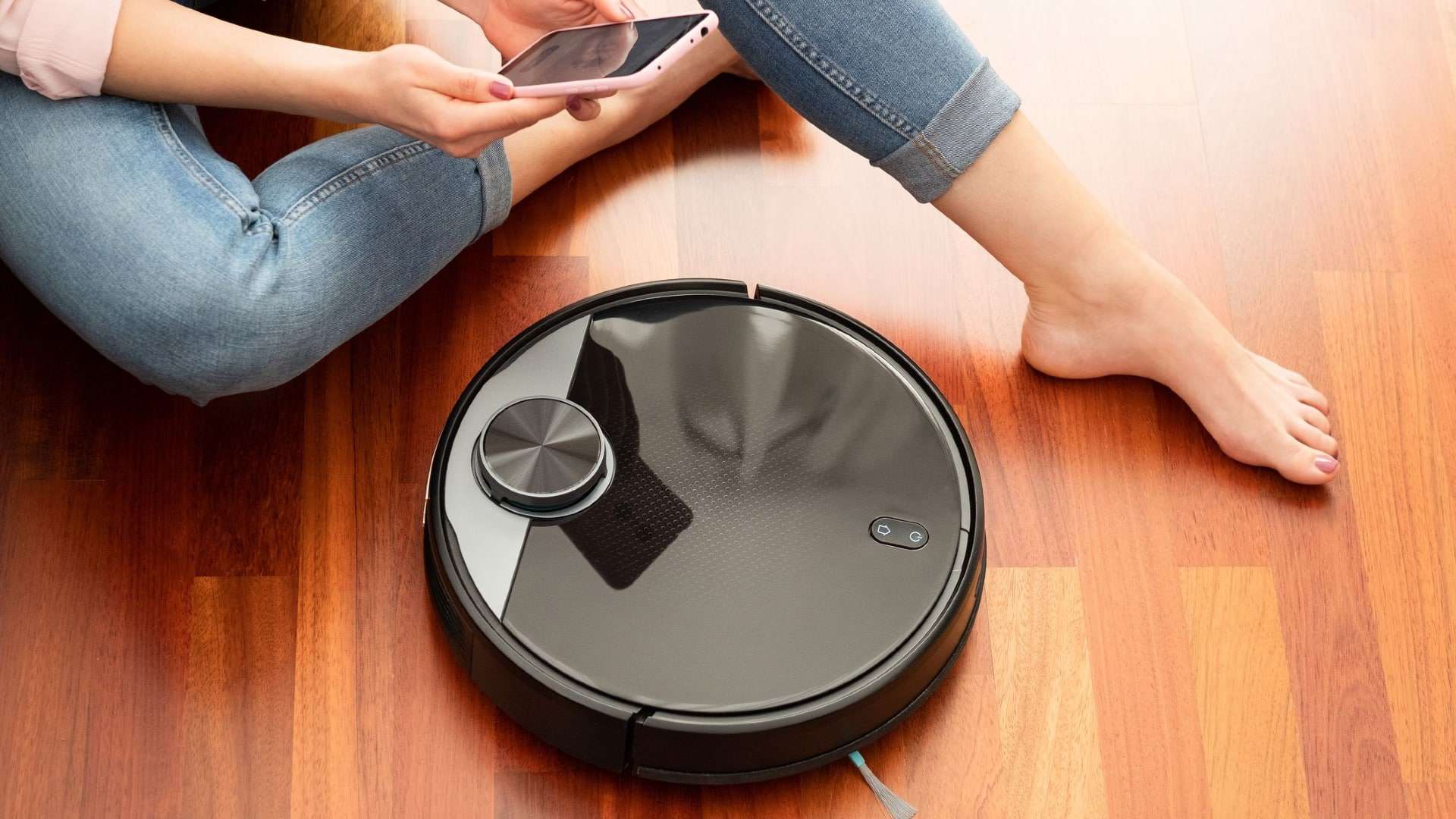 a robotic vacuum cleaner that records an intimate picture of a woman;  The photo was posted to Facebook