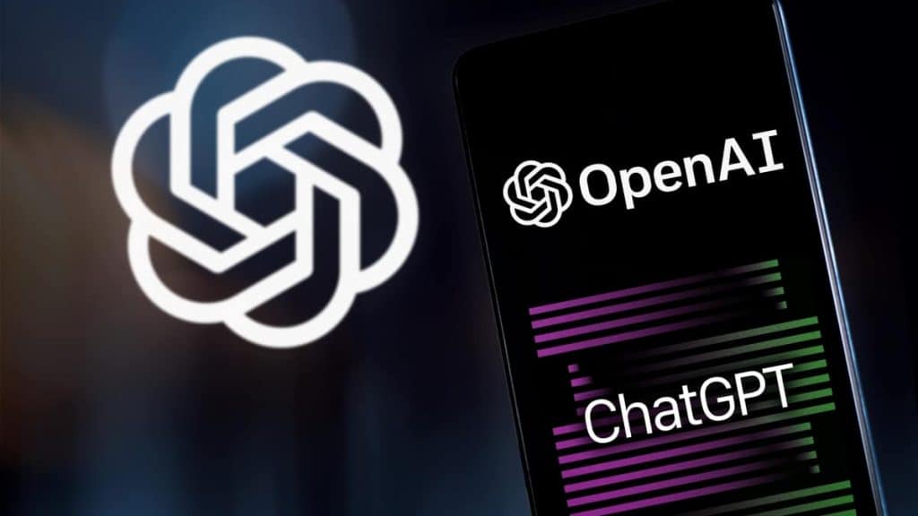 Mobile phone with the OpenAI and ChatGPT logos on the screen and the OpenAI logo in the background