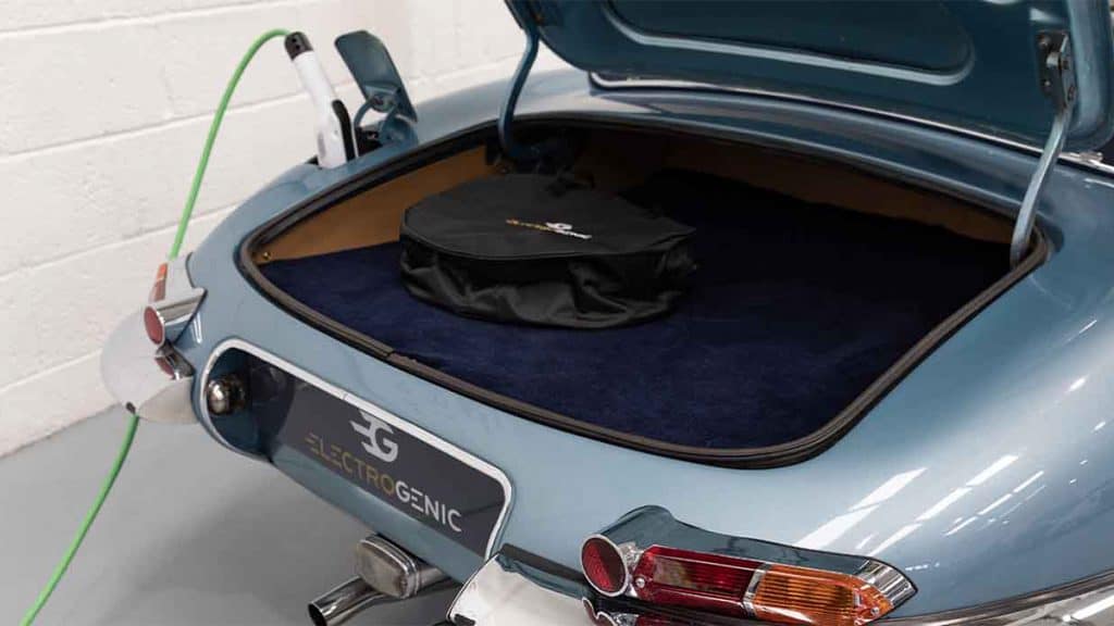 The rear with Jaguar's open trunk has been converted into an EV